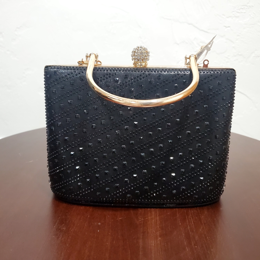 Elegant Black Handbag with Gold Accents